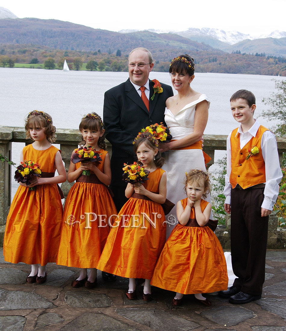 Flower Girl Dress in orange and brown with matching boy's vests