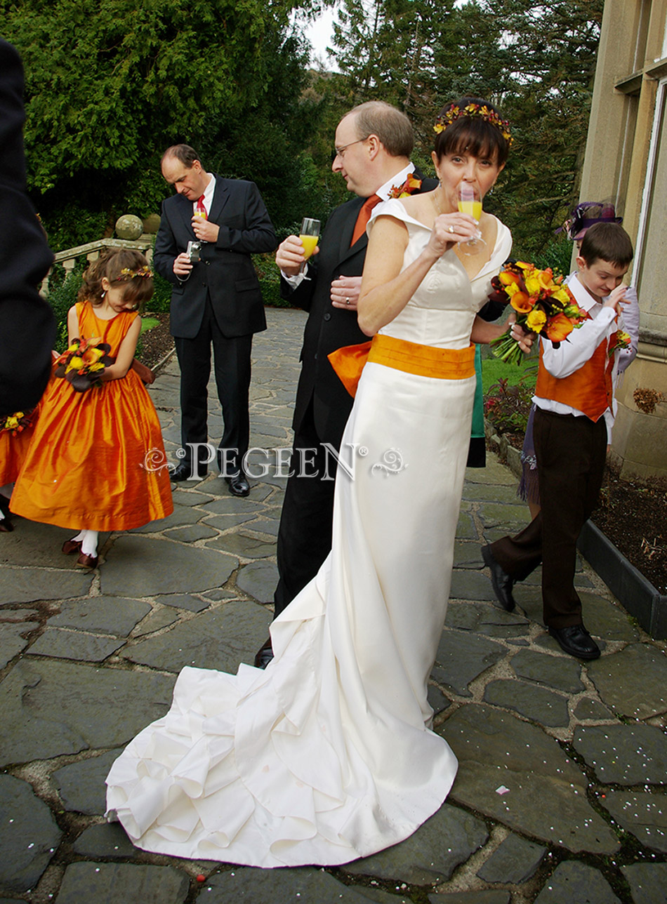 Flower Girl Dress in orange and brown with matching boy's vests