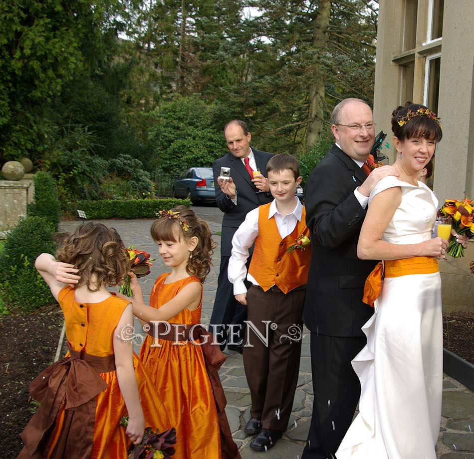 Flower Girl Dress in orange and brown with matching boy's vests