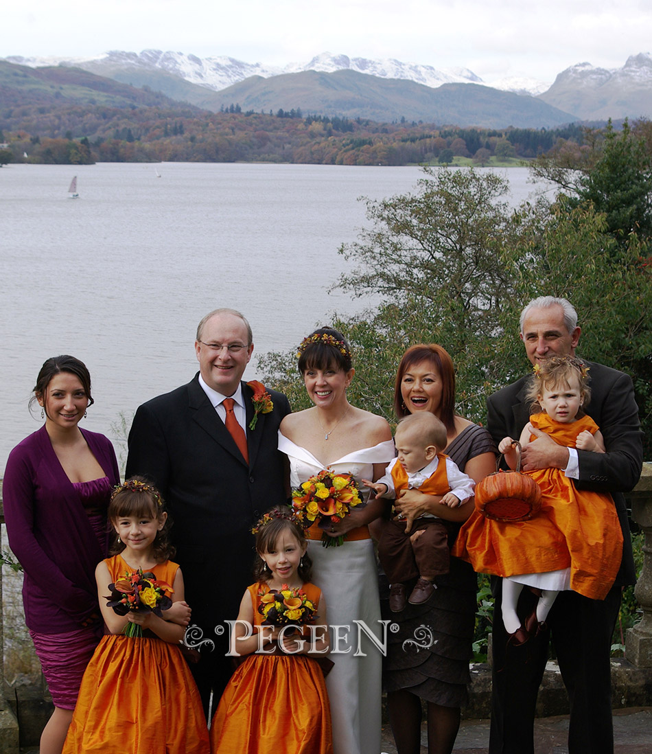 Flower Girl Dress in orange and brown with matching boy's vests