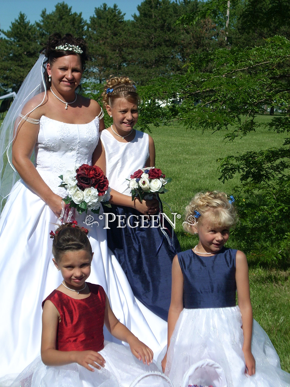 Red flower girl dresses in tulle by Pegeen