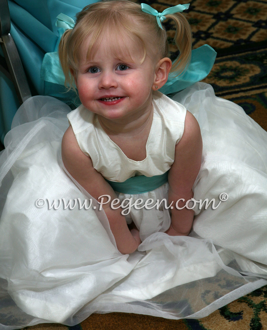 Pacific blue and ivory flower girl dresses by Pegeen