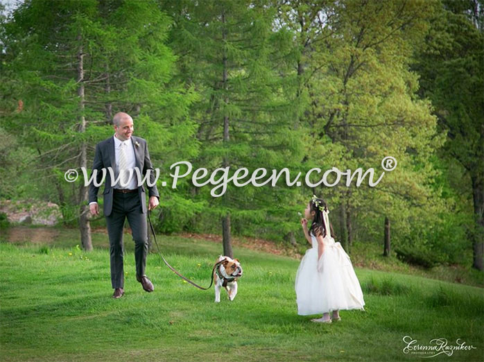 Ivory tulle flower girl dress with plenty of swirl in the tulle