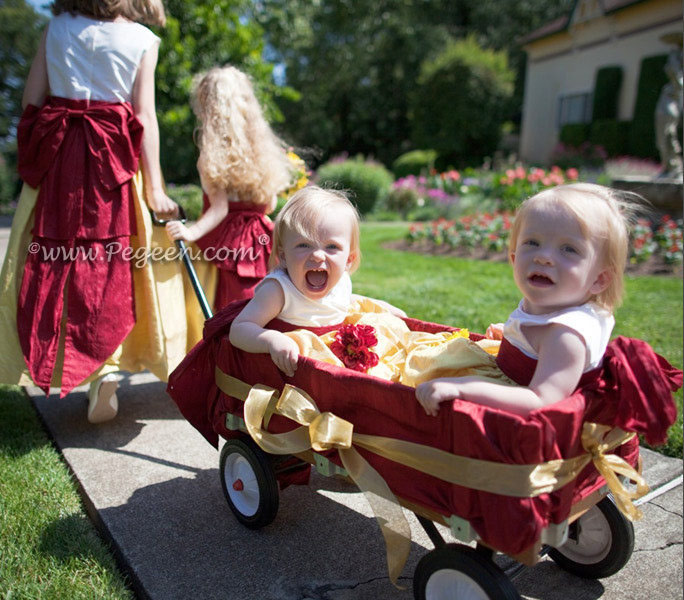 Pull the littlest flower girls in a wagon is a great idea for your wedding